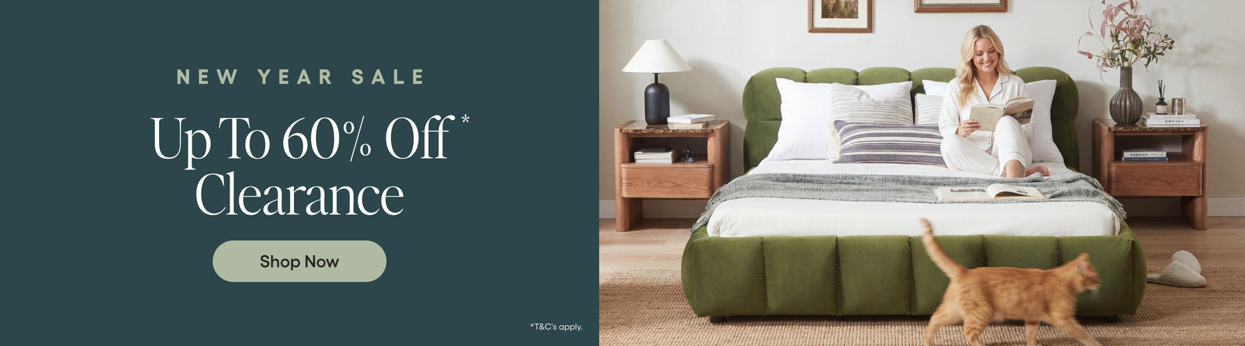 Bedroom scene with a green bed and a woman sitting on it, alongside a promotional banner for a New Year sale.